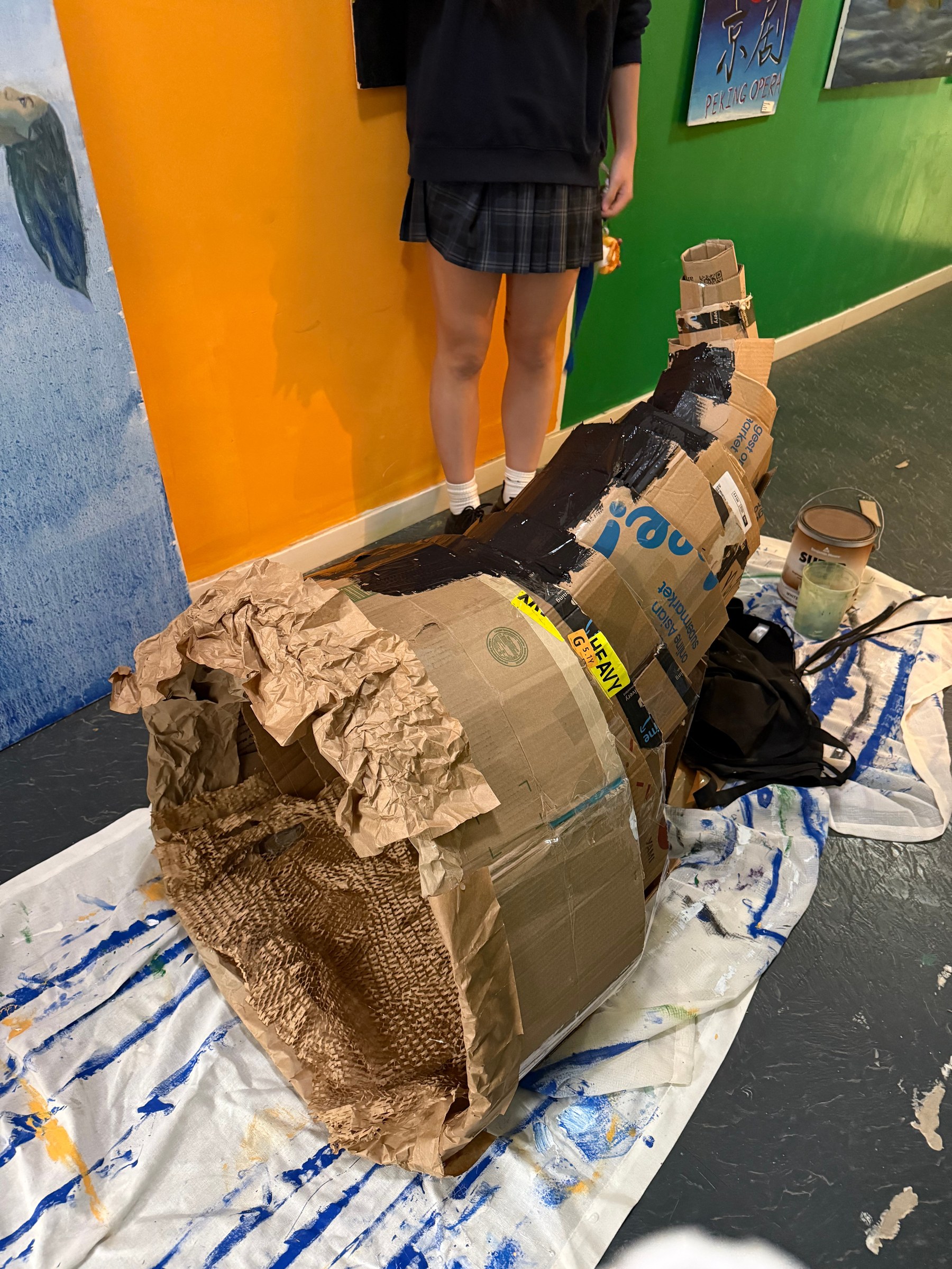 The cardboard sculpture being prepared for painting